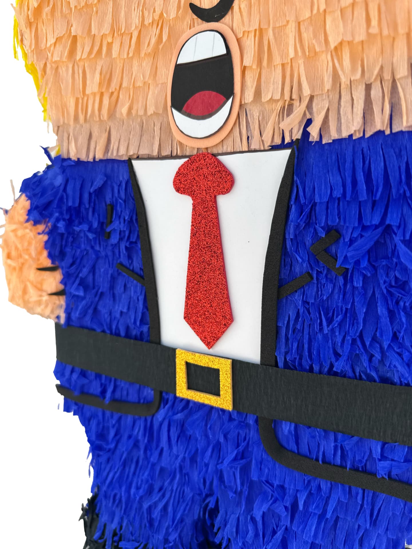 Close-up of the red glitter tie, black belt and gold buckle